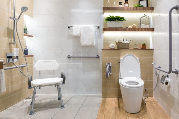 Interior of bathroom for the disabled or elderly people. Handrail for disabled and elderly people in the bathroom